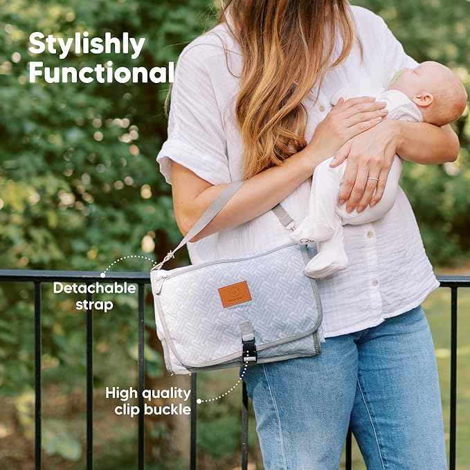 KeaBabies Portable Diaper Changing Pad - Large Waterproof Baby Changing Mat, Compact Travel Diaper Clutch, Functional Pockets Fit Newborn Essentials, Wipeable & Padded Baby Changer (Wild Patrol)