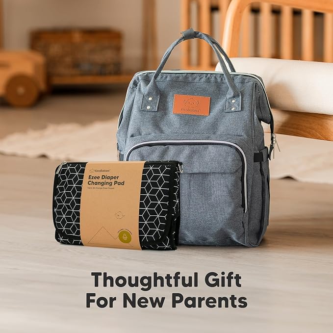 KeaBabies Portable Diaper Changing Pad - Large Waterproof Baby Changing Mat, Compact Travel Diaper Clutch, Functional Pockets Fit Newborn Essentials, Wipeable & Padded Baby Changer (Pixel)