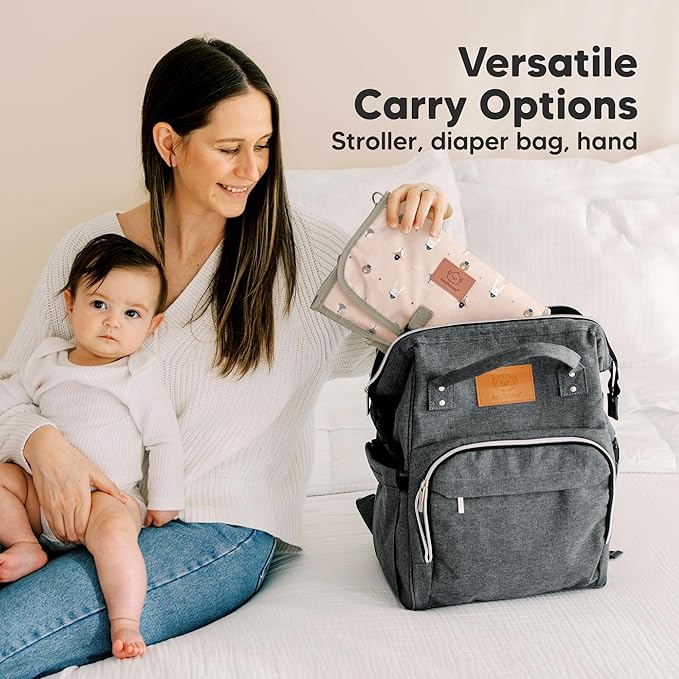 KeaBabies Portable Diaper Changing Pad - Large Waterproof Baby Changing Mat, Compact Travel Diaper Clutch, Functional Pockets Fit Newborn Essentials, Wipeable & Padded Baby Changer (Wild Patrol)