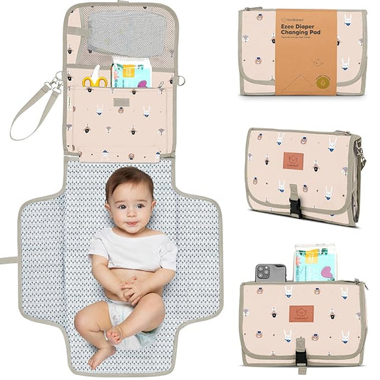 KeaBabies Portable Diaper Changing Pad - Large Waterproof Baby Changing Mat, Compact Travel Diaper Clutch, Functional Pockets Fit Newborn Essentials, Wipeable & Padded Baby Changer (Wild Patrol)